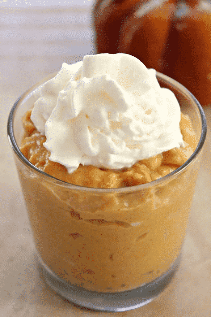 Pumpkin Pudding closeup with whipped cream