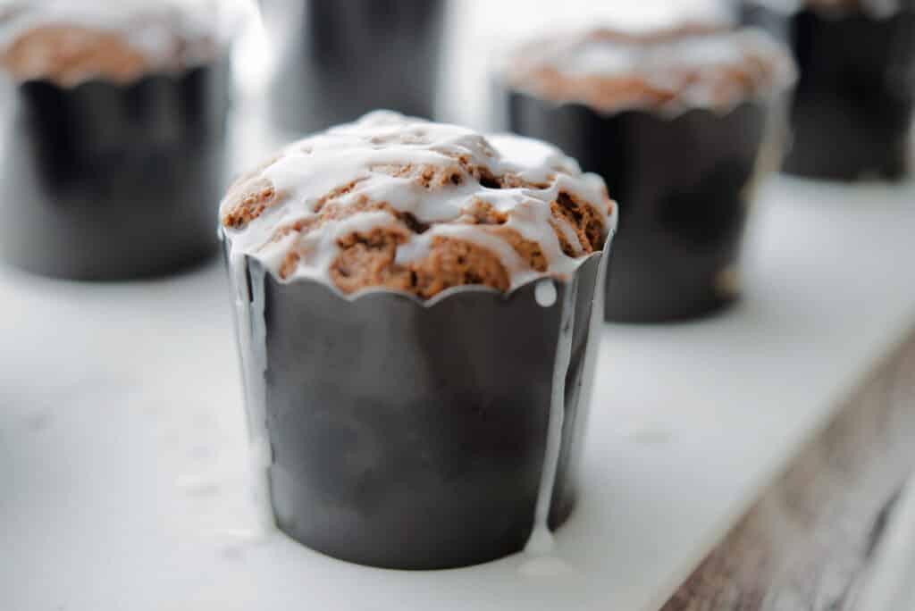Gingerbread Muffins in a black muffin cup