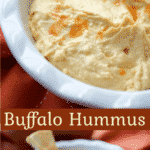 This Buffalo style hummus made with tabasco and crumbled bleu cheese is a quick, easy and deliciously spicy healthy snack. 