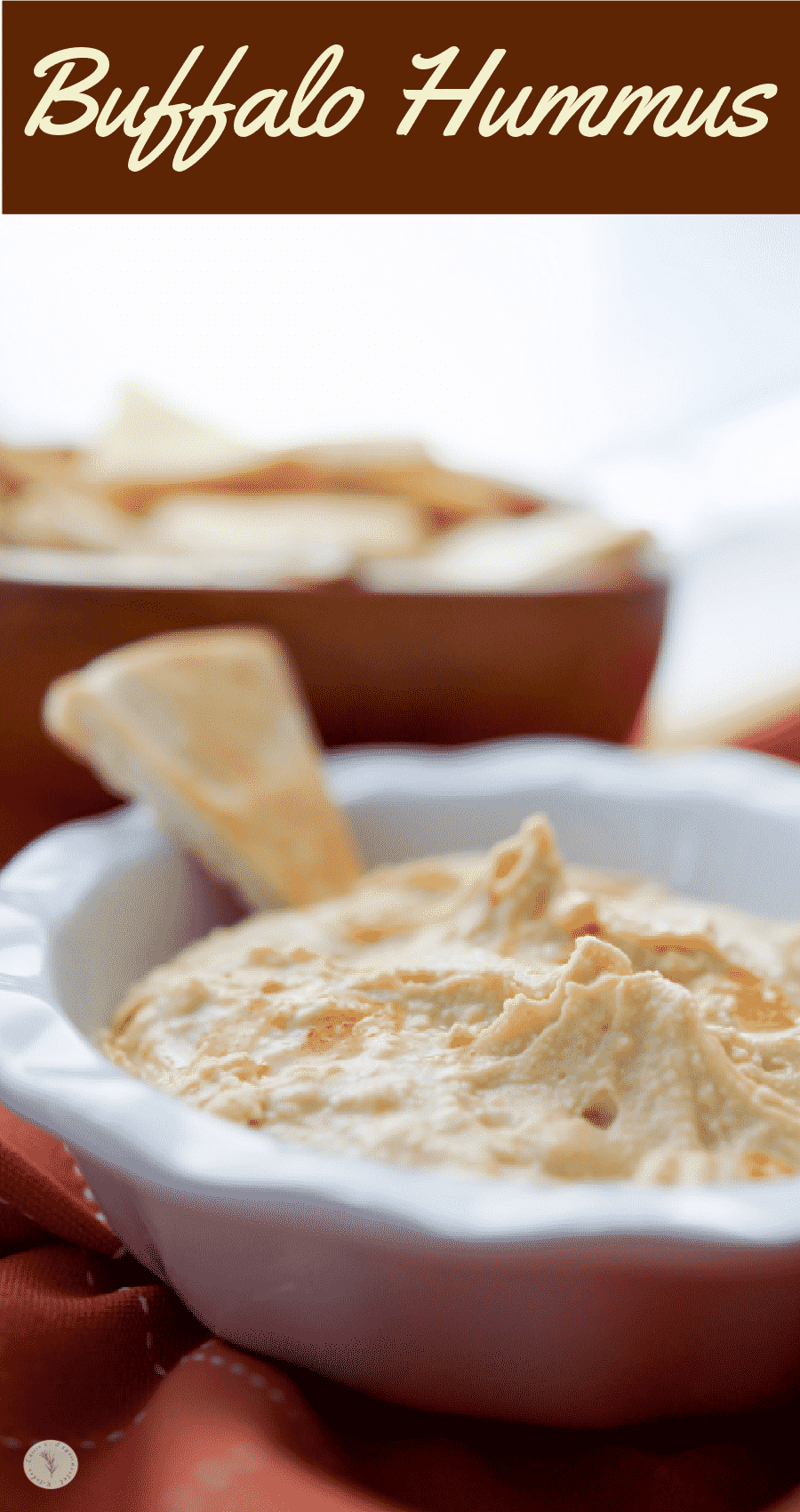 This Buffalo style hummus made with tabasco and crumbled bleu cheese is a quick, easy and deliciously spicy healthy snack. 