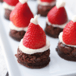 These festive Santa Hats are made with prepared brownie mix, fresh strawberries and homemade vanilla buttercream. 