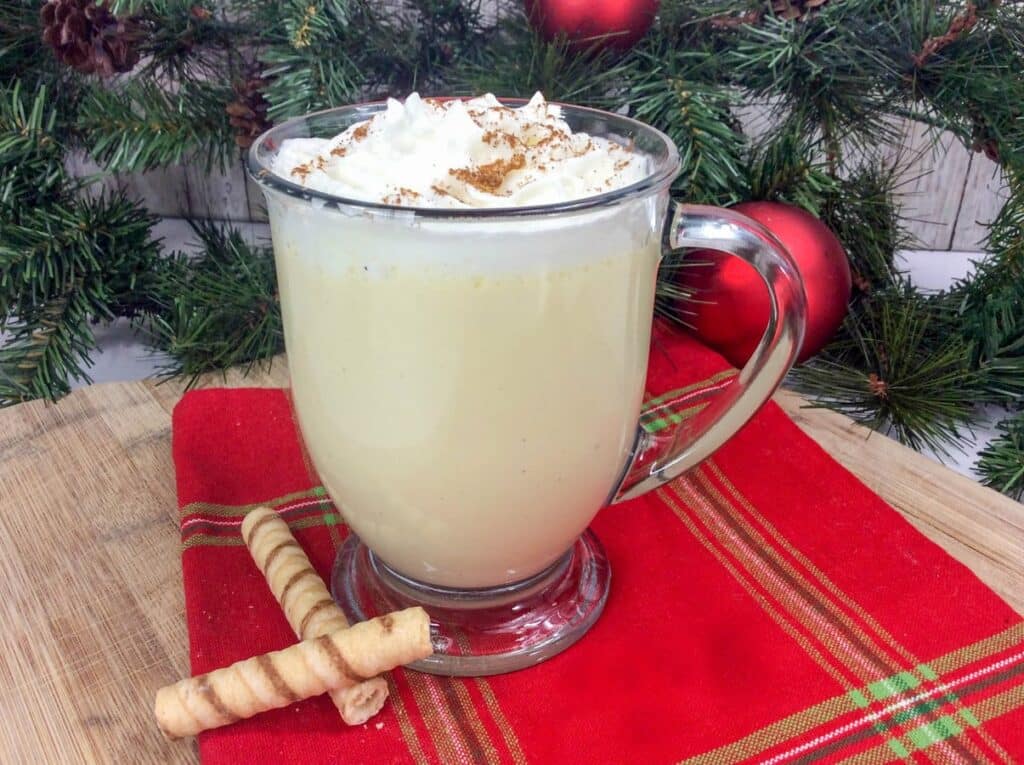 Homemade Eggnog in a glass mug. 