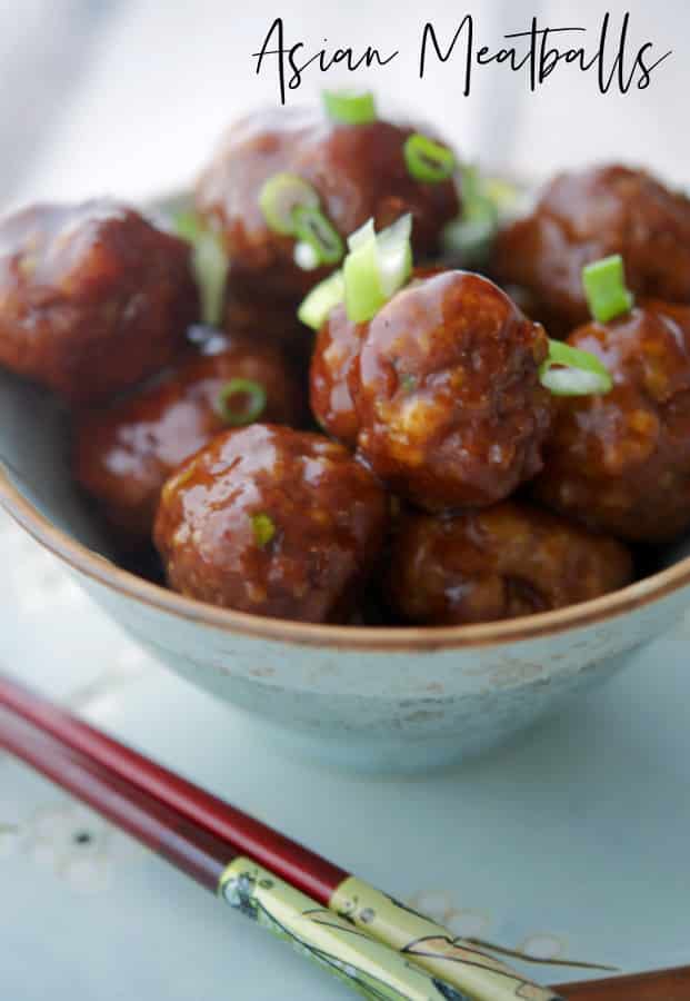A close up of a bowl of food, with Asian Meatballs