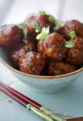 These Asian style meatballs made with lean ground beef in a honey, sesame soy sauce are delicious and great for entertaining. 
