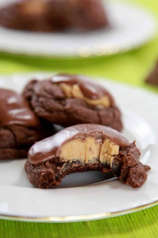 A piece of chocolate cake on a plate, with Peanut Butter