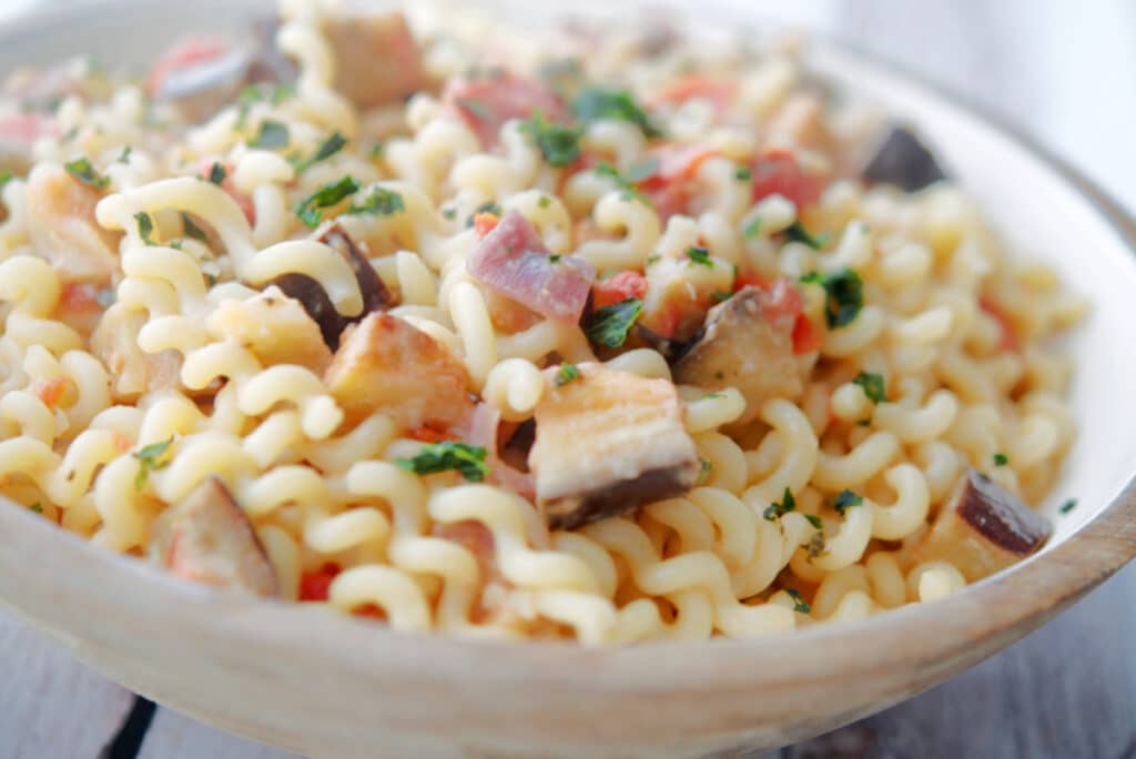 Fusilli Melanzana in a wooden pasta bowl