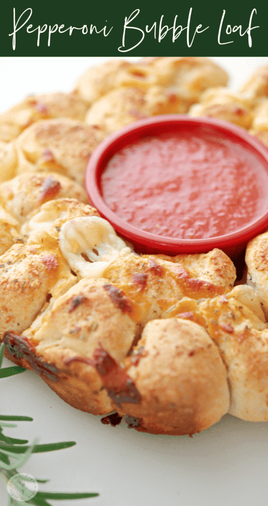 Pepperoni Bubble Loaf pull apart bread stuffed with spicy pepperoni and Mozzarella cheese; then brushed with a buttery Parmesan herb topping. 