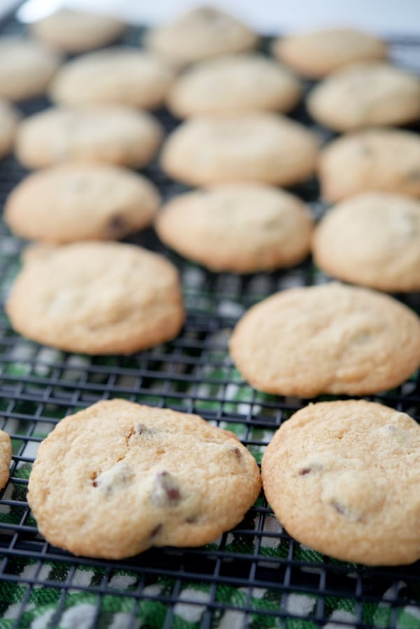 Irish Cream Chocolate Chip Cookies lined up on cooling rack