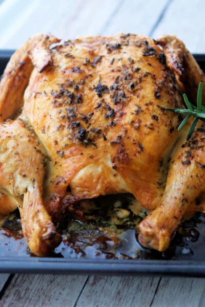 Rosemary Lemon Spatchcock Chicken is a quicker, light and super flavorful way to cook a whole roaster chicken. 
