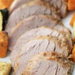 Tuscan herb Italian pork loin cooked on a sheet pan with fresh sweet potatoes and zucchini makes a deliciously easy weeknight meal. 