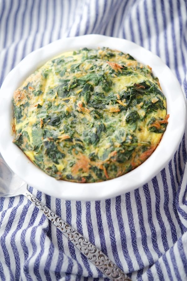Spinach Souffle in a dish with spoon