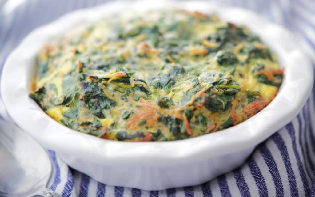 Spinach Souffle in a white dish