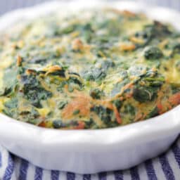 Spinach Souffle in a white dish