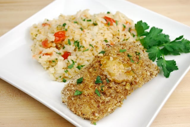 A plate of food on a table, with Salad and Steamed cod