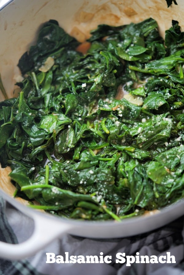 A pot with wilted spinach