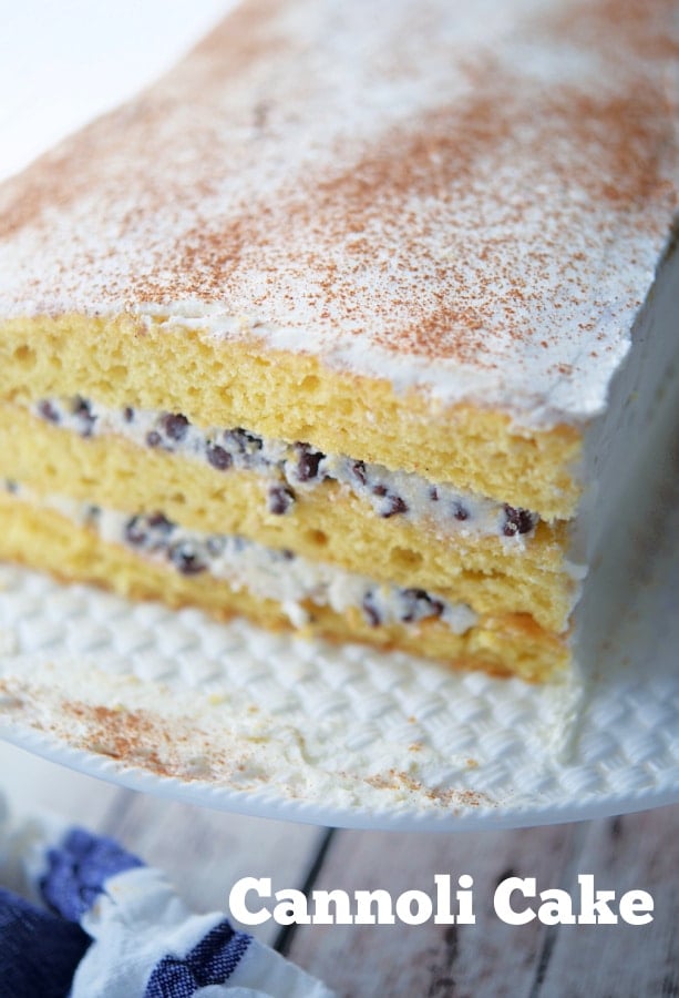 A piece of Cannoli cake on a plate