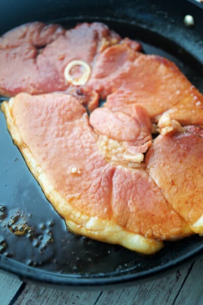 Honey Maple Ham Steak in a skillet