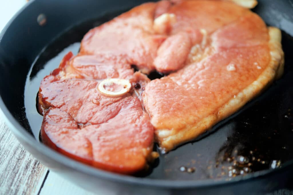 Ham steak in skillet
