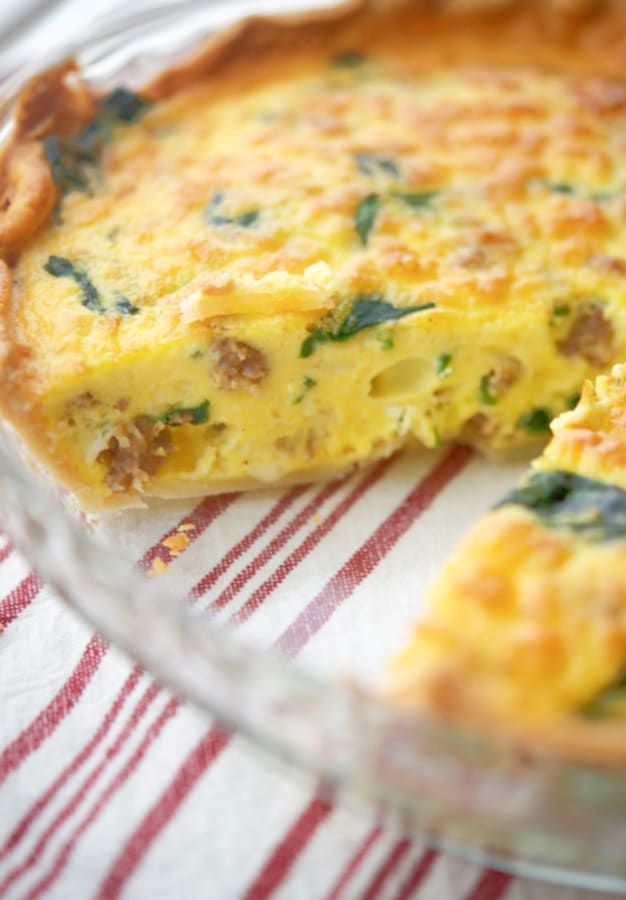Savory Sausage and Spinach Quiche in a pie dish