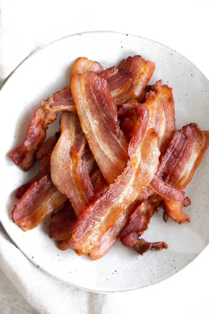 air fryer bacon on a white plate