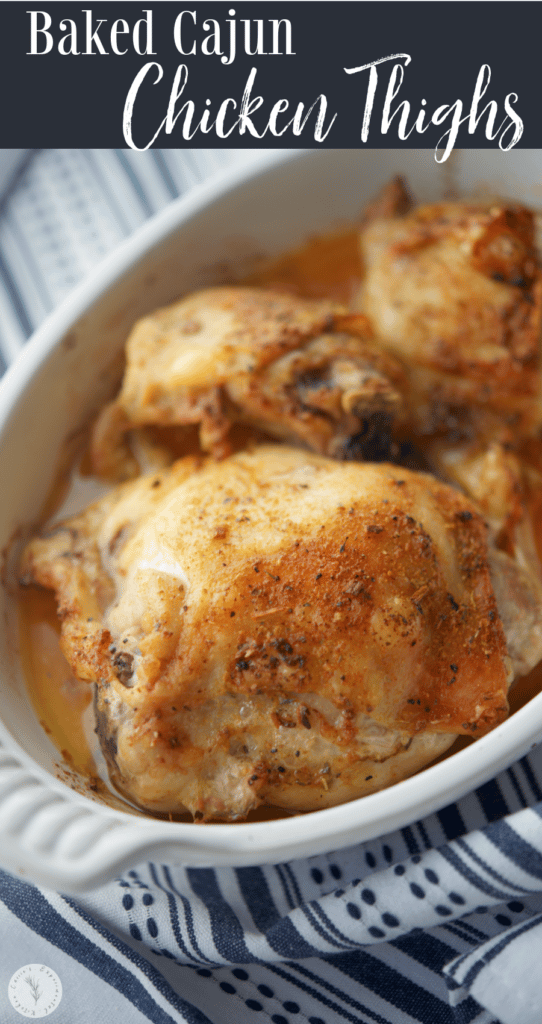 Baked Cajun Chicken Thighs in a white oven safe baking dish.
