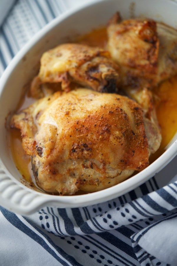 Cajun Chicken Thighs in a white dish. 