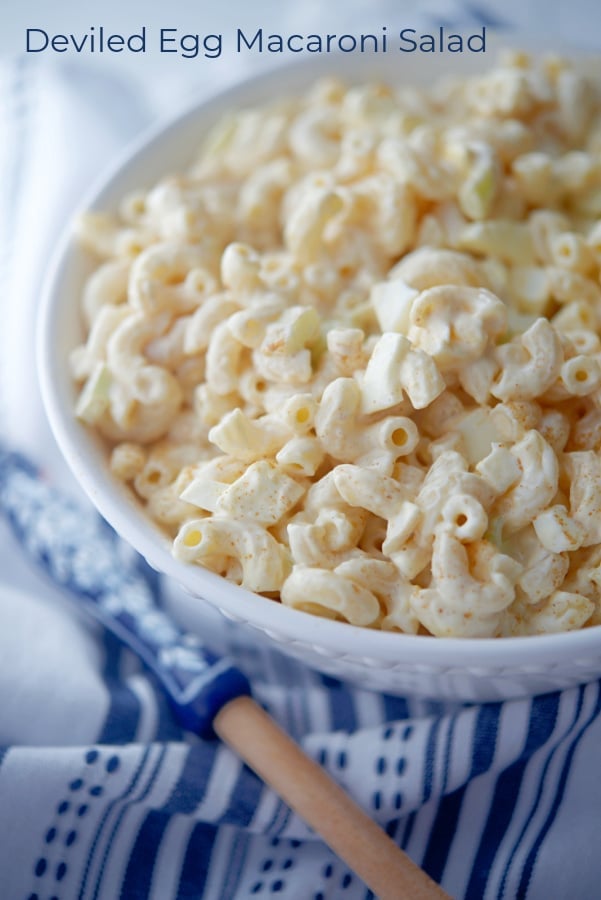 Deviled Egg Macaroni Salad in a white serving bowl.