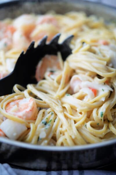 Seafood Linguine with pasta server