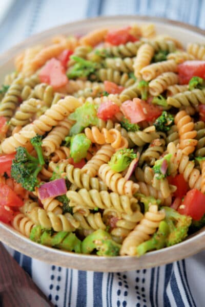 Tricolor Supreme Pasta salad in wooden bowl