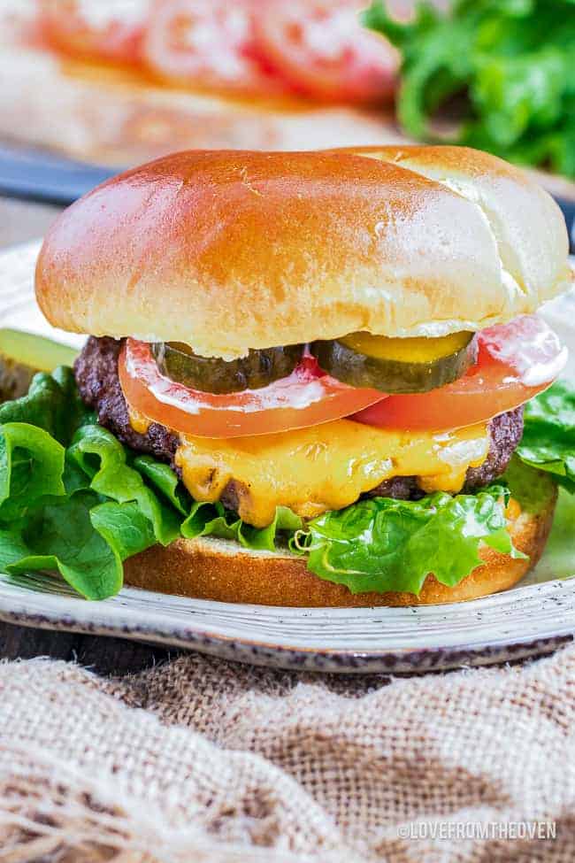 air fryer hamburger on a white plate