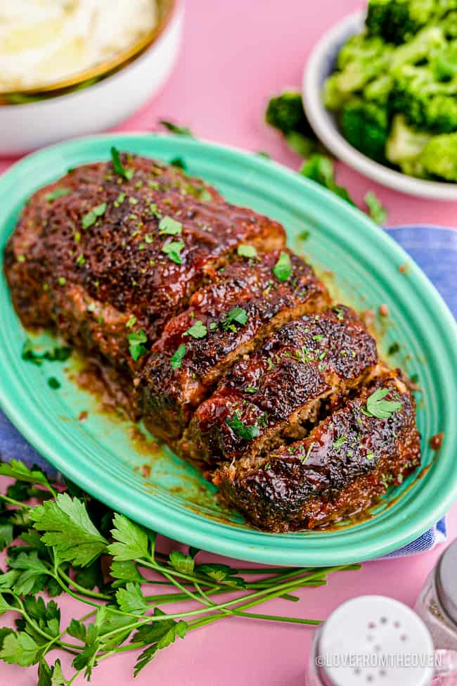 air fryer meatloaf sliced on a green plate