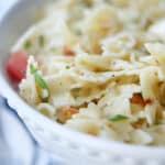 Caprese Pasta Salad with tomatoes, basil and mozzarella.