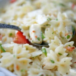 Caprese Pasta Salad on a spoon.