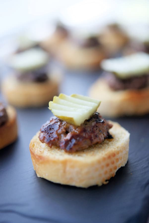 Cheeseburger Crostinis on a slate platter