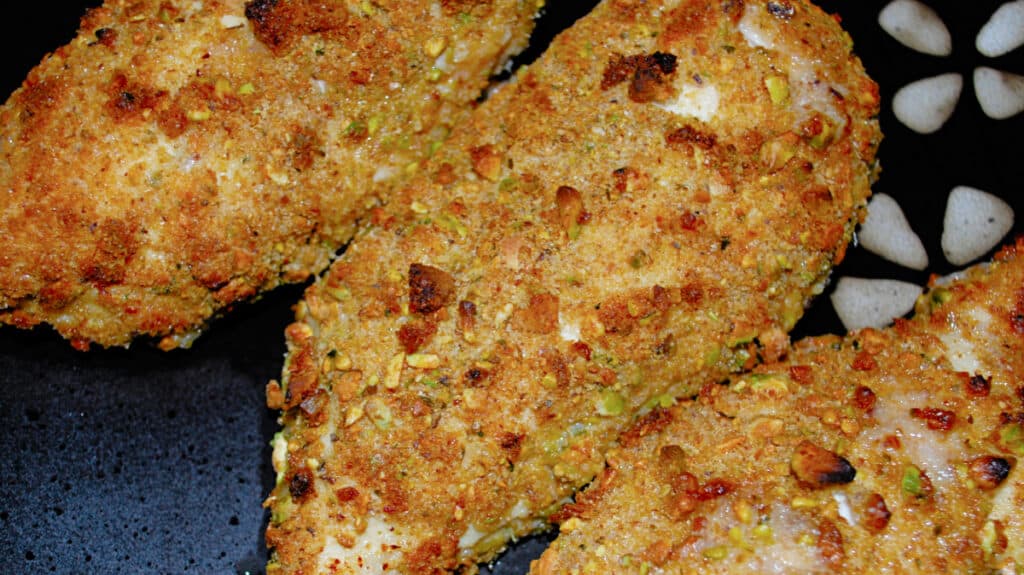 Pistachio Breaded Baked Chicken on a plate