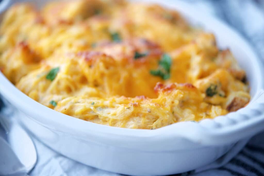 A close up of buffalo squash in a casserole dish.