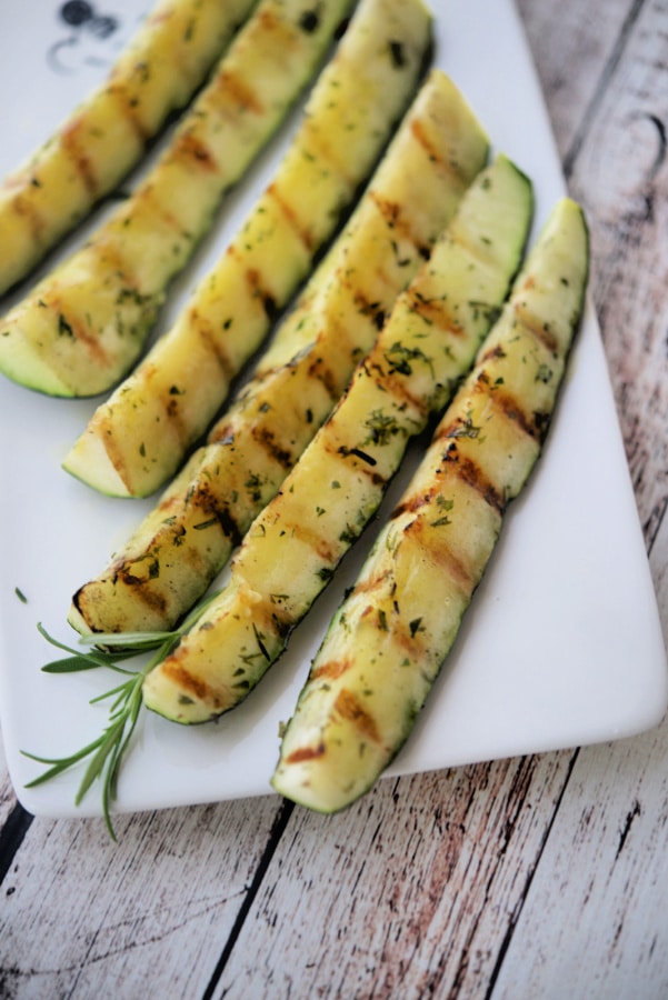 grilled zucchini on a white platter