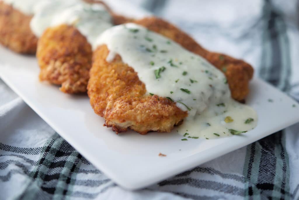 A close up of pork scaloppine