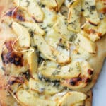 Creamy Brie Apple Flatbread on cutting board