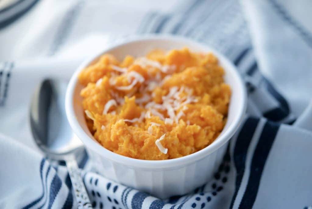 A close up of mashed coconut sweet potatoes