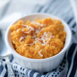 A close up of mashed coconut sweet potatoes