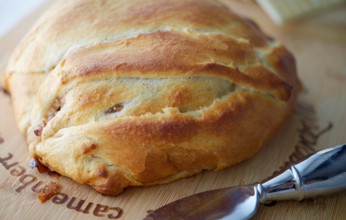 A close up of baked brie en croute