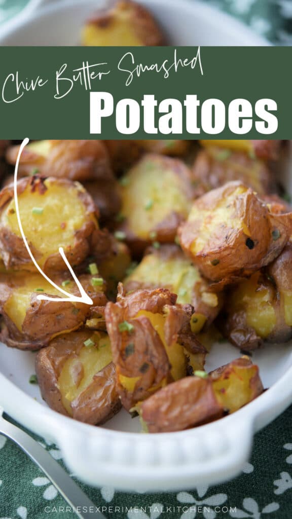 A close up of Chive Butter Smashed Potatoes in a white dish.