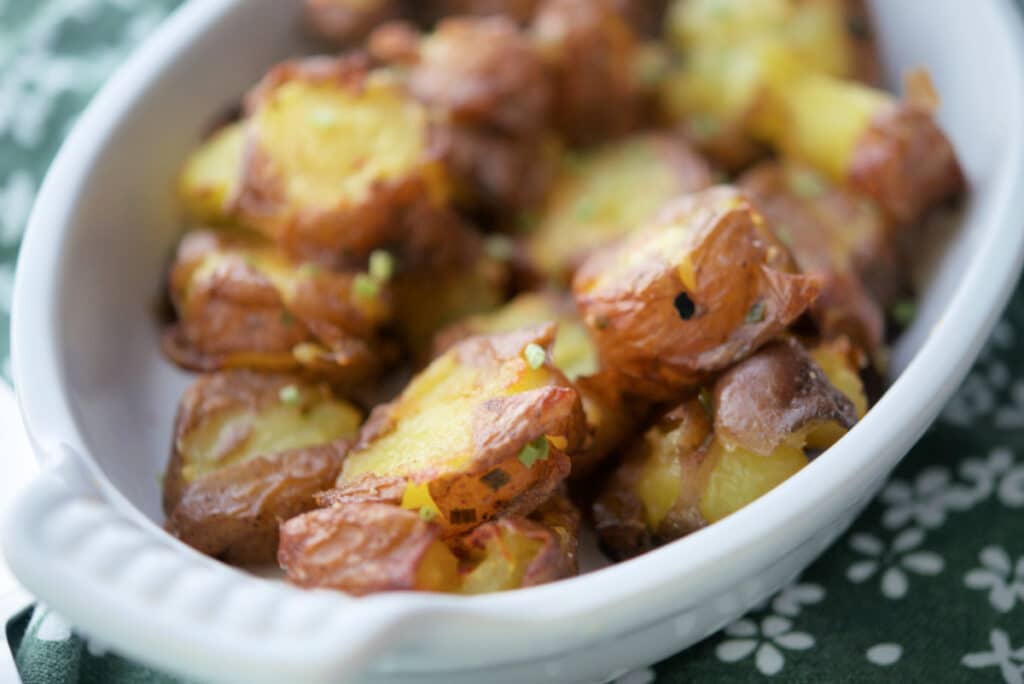 A close up of smashed potatoes