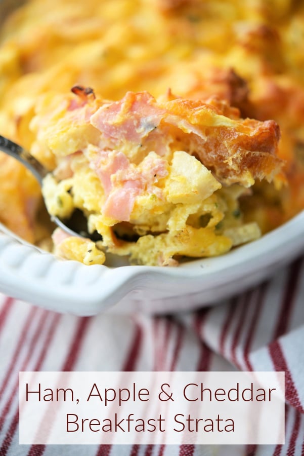 Breakfast casserole with ham on a spoon