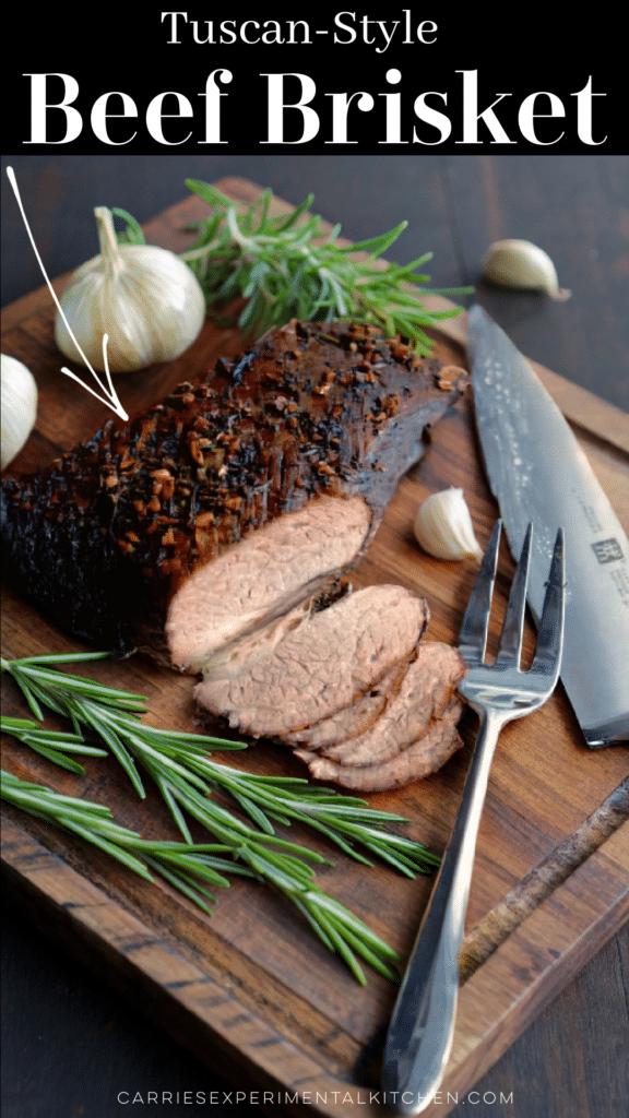 a cooked beef brisket on a dark wooden cutting bord