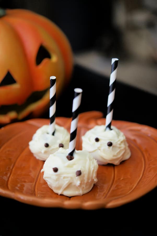 Mummy Pops on a pumpkin orange plate