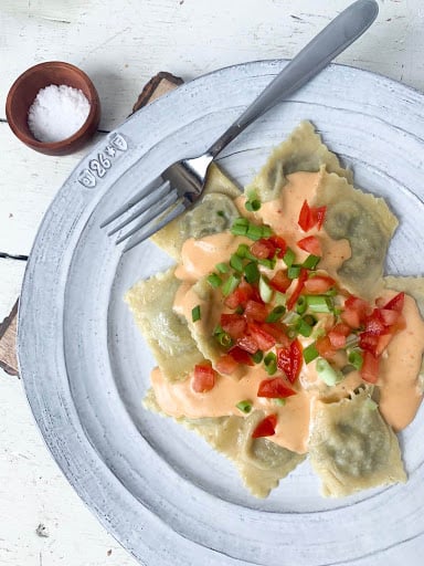 mushroom ravioli on a white plate