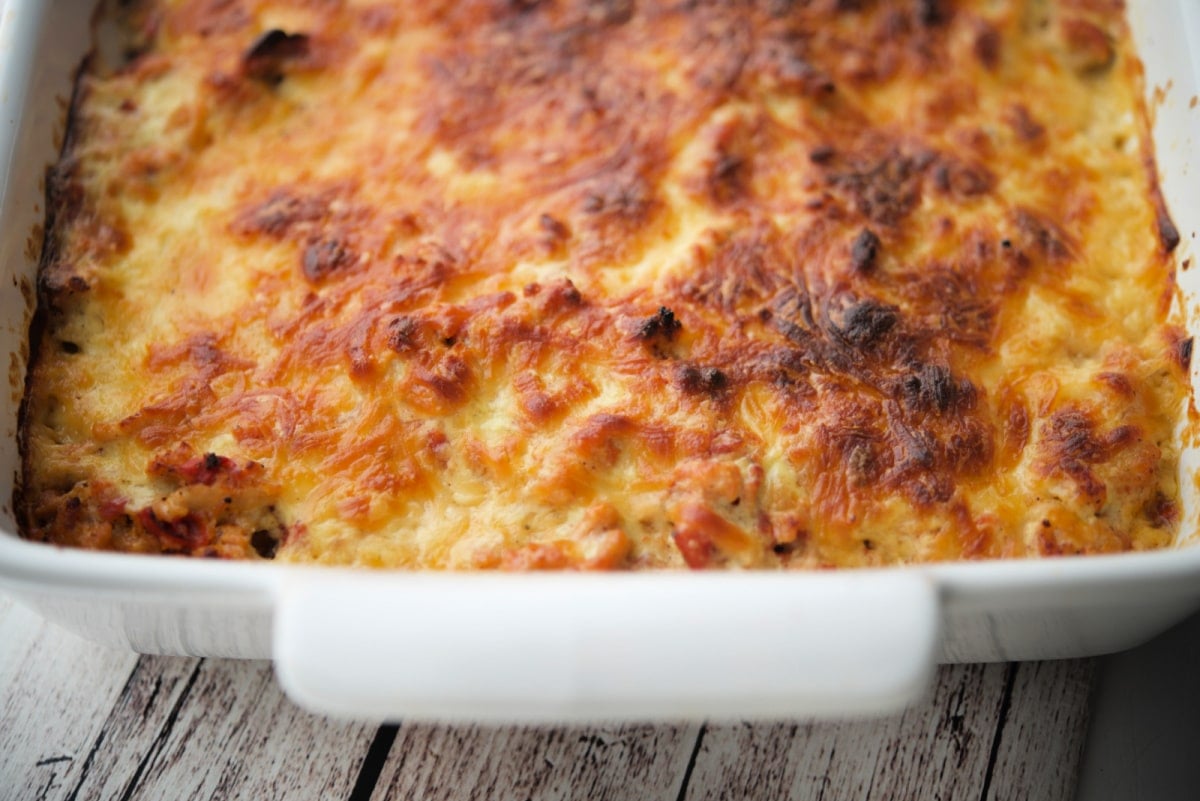a close up of a casserole with chicken and eggplant