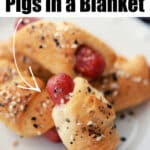 Pigs in a blanket on a white plate